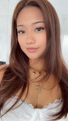 Woman applying ONYX Lash Australia lash clusters in style Old Money